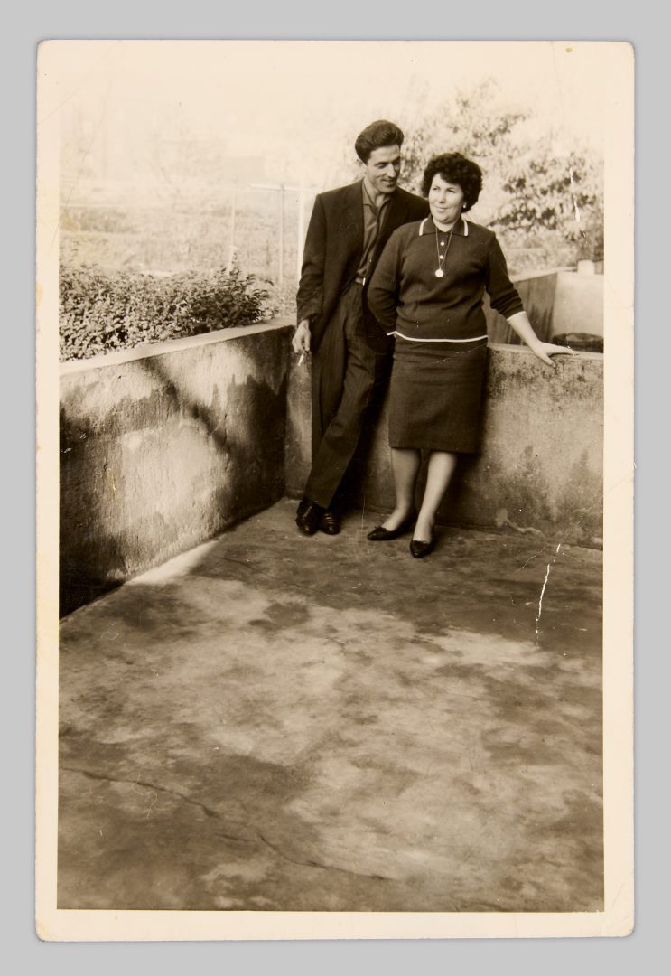The first photograph of Ovidio Fernández García and Ceferina García García in Germany.  
Essen-Schonnebeck, 1962. Ceferina had just arrived in Germany. The couple was able to rent a room in an apartment. Ceferina adopted her husband’s surname “Fernández García” for the first time to be recognized as a married couple and to avoid problems with landlords and neighbours. At that time, unmarried couples were not allowed to rent accommodation together. © Cristina Fernández-Moser 